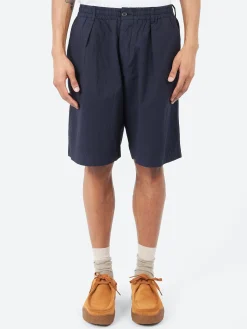 Universal Works - Pleated Track Shorts in Navy